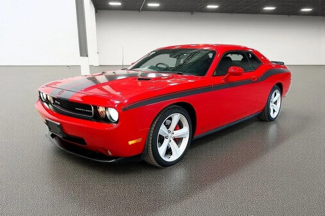 The same red Dodge Challenger on a clean showroom floor, staged by AutoLander’s AI Photo Studio