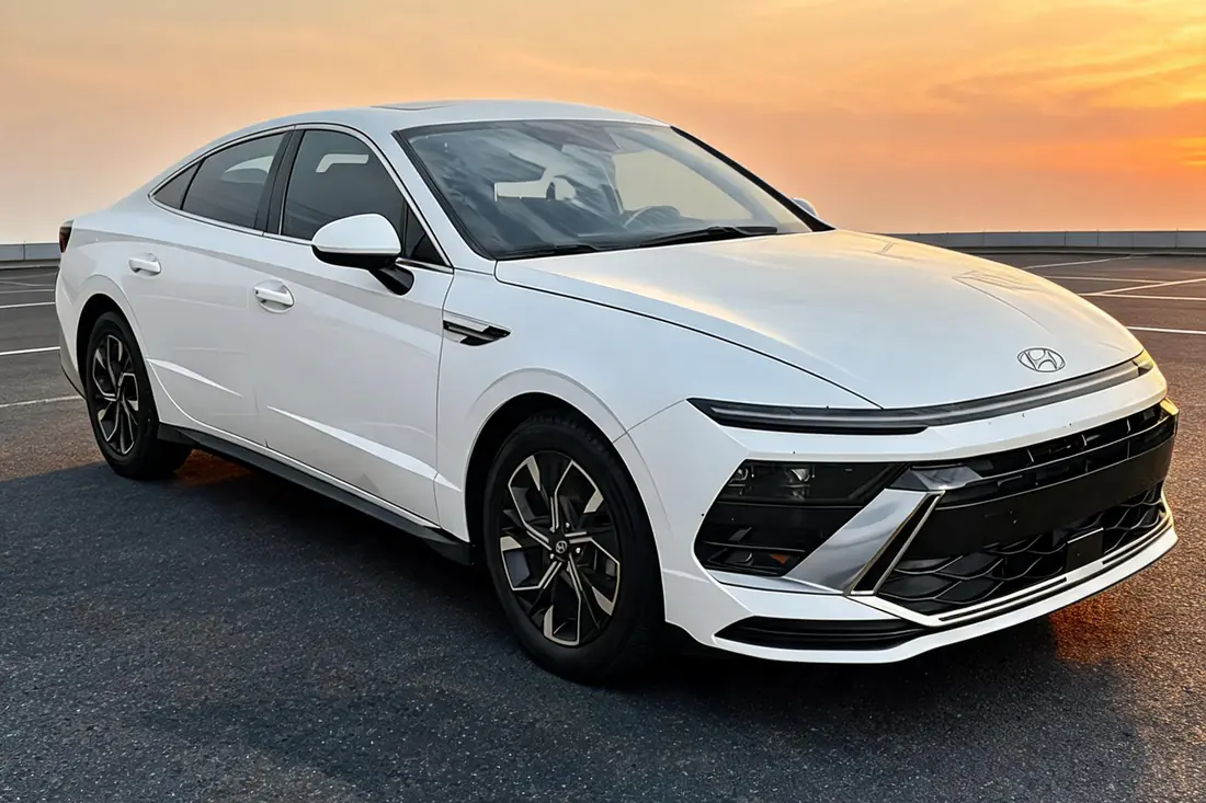 The same 2024 Hyundai Sonata as a showroom-grade Facebook Marketplace listing photo after AutoLander’s AI Photo Studio