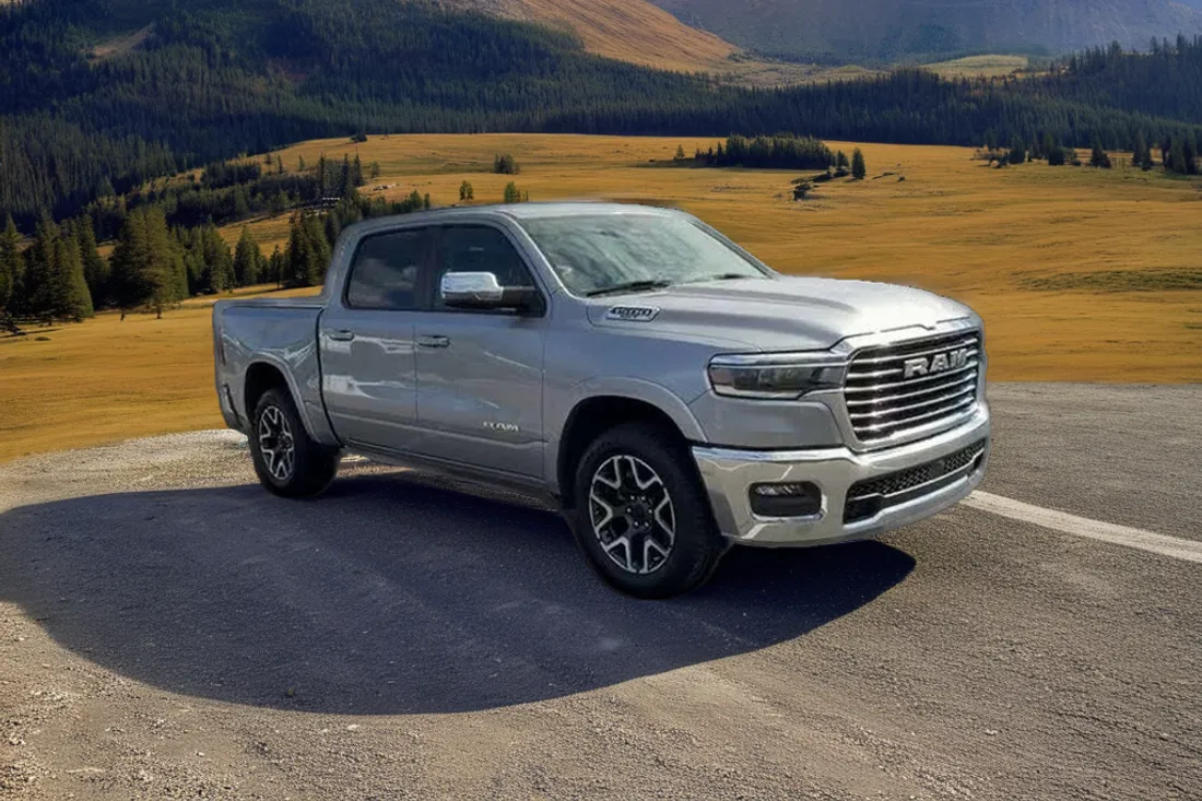 The same silver RAM 1500 Laramie in a mountain meadow scene created by AutoLander’s AI Photo Studio